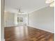 Bright and open living room featuring hardwood floors and large windows at 5546 W Vistaview Trl, McCordsville, IN 46055
