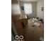 Bedroom featuring a cluttered room with personal items in a state of disrepair at 5834 42Nd St, Indianapolis, IN 46226