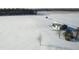 Aerial drone view of snowy barn with a blue accent wall on a winter day at 5895 W 265 N, Columbus, IN 47201