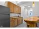This lower-level bar area features beautiful wood cabinets and a striking live edge bar top at 5895 W 265 N, Columbus, IN 47201