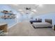 Spacious finished basement with three beds, carpeted flooring, recessed lighting and shelving at 5895 W 265 N, Columbus, IN 47201