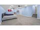 Spacious finished basement with three beds, carpeted flooring, and recessed lighting at 5895 W 265 N, Columbus, IN 47201