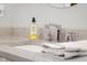 Close up shot of a bathroom sink with hand soap and a neatly folded towel at 5895 W 265 N, Columbus, IN 47201