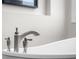 Close-up of a modern, elegant bathtub faucet with a brushed nickel finish at 5895 W 265 N, Columbus, IN 47201