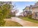 Beautiful home showcasing a well-manicured lawn and circular driveway, perfect for curb appeal at 5895 W 265 N, Columbus, IN 47201