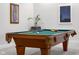 Close up of finished basement pool table, decor and neutral walls at 5895 W 265 N, Columbus, IN 47201