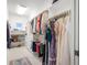 Well-organized walk-in closet with shelves and rods for clothes and accessories at 5895 W 265 N, Columbus, IN 47201