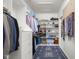 Walk-in closet with custom shelving, drawers, and hanging rods at 5895 W 265 N, Columbus, IN 47201