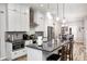Stylish kitchen featuring stainless appliances, sleek countertops, and ample cabinet space at 602 E Beecher St, Indianapolis, IN 46203