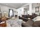 Open living room featuring a stylish sofa, decorative rug, and neutral wall colors at 602 E Beecher St, Indianapolis, IN 46203