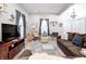 Well-appointed living room with a modern sofa, stylish decor, and ample natural light at 602 E Beecher St, Indianapolis, IN 46203