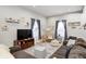 Inviting living room with a spacious layout, cozy seating, and natural light at 602 E Beecher St, Indianapolis, IN 46203