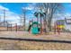Playground with multiple play structures and lots of open play space for outdoor community recreation at 602 E Beecher St, Indianapolis, IN 46203