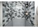 Contemporary shower with sleek tile design and modern showerhead at 602 E Beecher St, Indianapolis, IN 46203