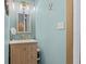 Bathroom featuring updated vanity with modern fixtures and a neutral color palette at 6428 Bluff Crest Ct, Indianapolis, IN 46217