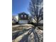 Charming two-story home with brick and siding, featuring a two-car garage and a well-maintained front yard at 6817 Everbloom Ln, Indianapolis, IN 46217