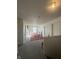 Bright upstairs hallway leading to bedrooms, featuring carpeted floors and access to multiple rooms at 6817 Everbloom Ln, Indianapolis, IN 46217