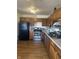 Efficient kitchen featuring stainless steel appliances and ample cabinet space at 6817 Everbloom Ln, Indianapolis, IN 46217
