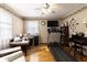 Versatile bedroom space with hardwood floors and ceiling fan at 7089 W 150 N, Greenfield, IN 46140