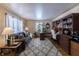 Comfortable living room with a cozy sofa and a built-in desk area at 7089 W 150 N, Greenfield, IN 46140