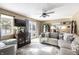 Inviting living room features stylish decor, comfortable seating, and a view of the outdoors at 7089 W 150 N, Greenfield, IN 46140