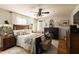 This cozy main bedroom features a fireplace and charming decor at 7089 W 150 N, Greenfield, IN 46140