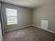 Carpeted bedroom featuring a window, painted in neutral color at 1256 Turner Trace N Pl, Avon, IN 46123
