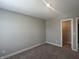 A well-lit, carpeted bedroom featuring a closet at 1256 Turner Trace N Pl, Avon, IN 46123