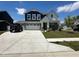 Charming two-story home featuring a three-car garage and beautiful landscaping at 1256 Turner Trace N Pl, Avon, IN 46123