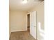 Cozy bedroom featuring neutral paint, carpet flooring, and a convenient closet access at 1343 Edgemont Ave, Indianapolis, IN 46208