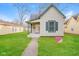 Charming single-Gathering home with a well-maintained lawn and inviting entrance at 1343 Edgemont Ave, Indianapolis, IN 46208