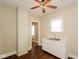 The kitchen features white cabinets and countertops, and a stainless steel sink at 1343 Edgemont Ave, Indianapolis, IN 46208