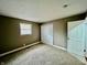 Bedroom with neutral walls, plush carpeting, and double door closet at 1820 N Dequincy St, Indianapolis, IN 46218
