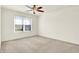 Light and airy bedroom with ceiling fan and large window at 1837 Dogwood Lake Way, Indianapolis, IN 46239