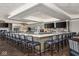 Elegant bar area with a large countertop, comfortable seating, and an extensive selection of spirits at 19868 Chatham Shore Ln, Westfield, IN 46074
