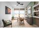 Bright home office with a large window, modern decor, and stylish furnishings at 19868 Chatham Shore Ln, Westfield, IN 46074