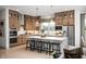 Spacious kitchen with stainless steel appliances, center island, and custom cabinets at 19868 Chatham Shore Ln, Westfield, IN 46074