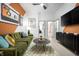 Fun living room with colorful walls, modern furnishings, and stylish decor at 19868 Chatham Shore Ln, Westfield, IN 46074