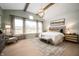 Bright main bedroom featuring large windows, a decorative chandelier, and elegant furnishings at 19868 Chatham Shore Ln, Westfield, IN 46074