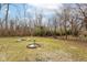 Spacious backyard with mature trees and plenty of room for outdoor activities at 3095 W 69Th St, Indianapolis, IN 46268