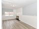 Finished basement with new floors, a fireplace, and updated lighting at 3095 W 69Th St, Indianapolis, IN 46268