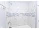 Updated bathroom featuring tiled shower, fresh paint, and new fixtures at 3095 W 69Th St, Indianapolis, IN 46268