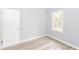 Bright bedroom with modern flooring and fresh paint ready for new residents at 3095 W 69Th St, Indianapolis, IN 46268