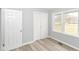 Bedroom featuring new flooring, fresh paint, and natural light at 3095 W 69Th St, Indianapolis, IN 46268