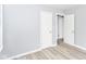 Bedroom with light walls, closet and three doors at 3095 W 69Th St, Indianapolis, IN 46268