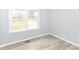Bright bedroom with modern flooring and fresh paint ready for new residents at 3095 W 69Th St, Indianapolis, IN 46268