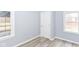 Cozy bedroom with large windows providing natural light and neutral wall color at 3095 W 69Th St, Indianapolis, IN 46268