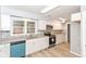 Modern kitchen featuring granite countertops, stainless steel appliances, and white cabinets at 3095 W 69Th St, Indianapolis, IN 46268