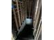 Basement staircase reveals unfinished potential for a buyer to customize and renovate to their specifications at 3178 Graceland Ave, Indianapolis, IN 46208