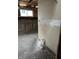 Unfinished space with hardwood floors and exposed framing, awaiting renovation and design for a buyer's touch at 3178 Graceland Ave, Indianapolis, IN 46208